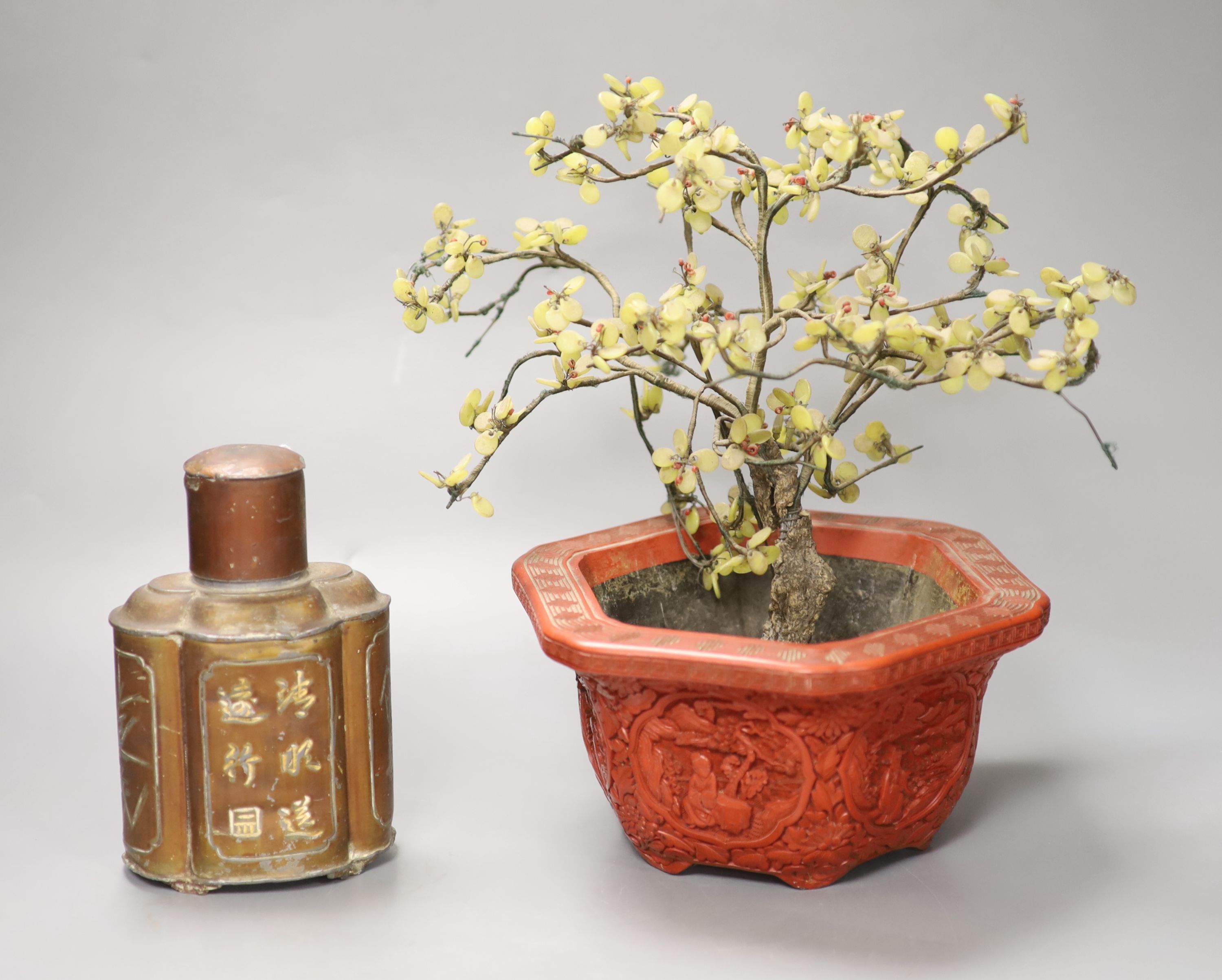 A Chinese hardstone miniature tree in hexagonal cinnabar lacquer jardiniere and a lacquered pewter tea caddy